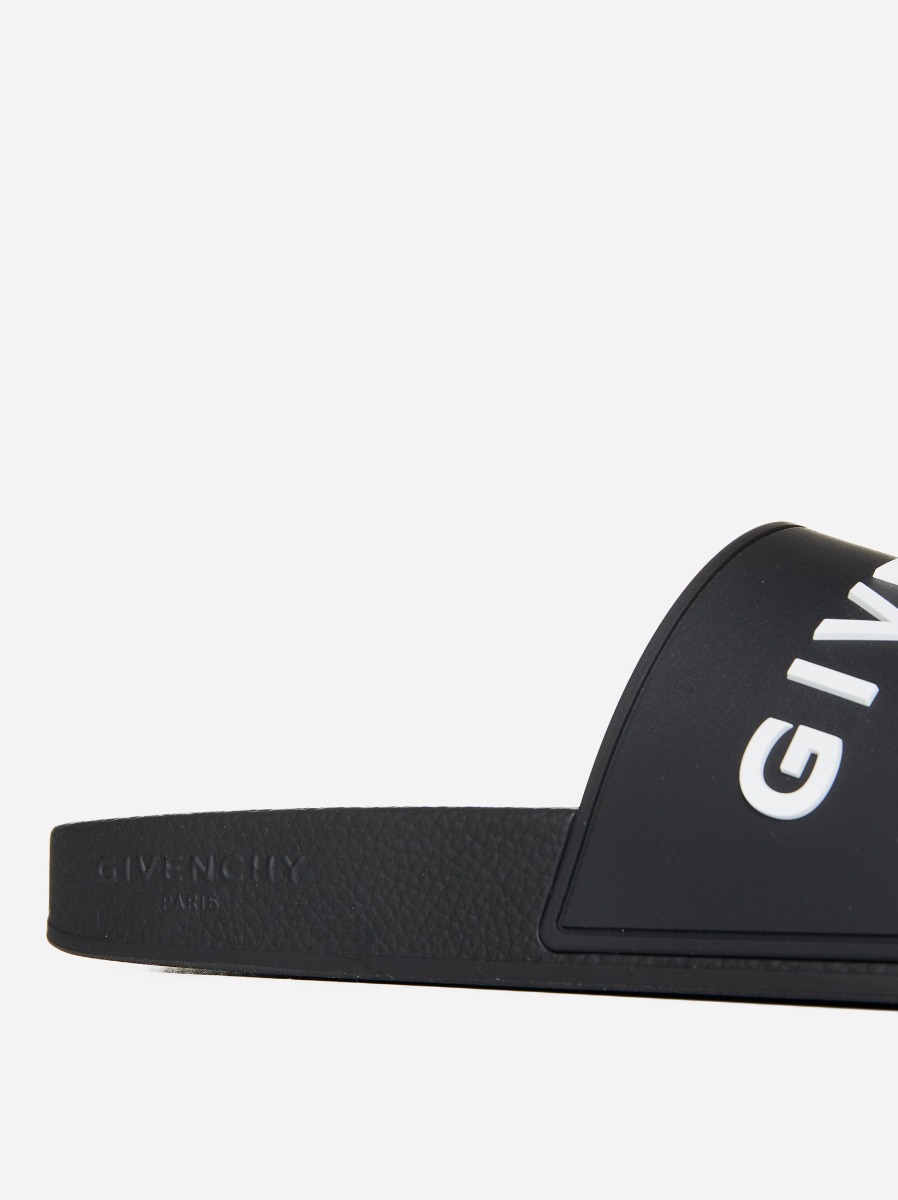 GIVENCHY Slides flat in gomma con logo Novità