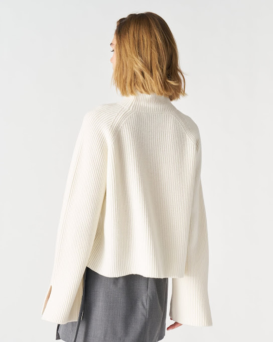 Suoli Maglia Collo Alto Spacchi Manica 50% di sconto per tempo limitato