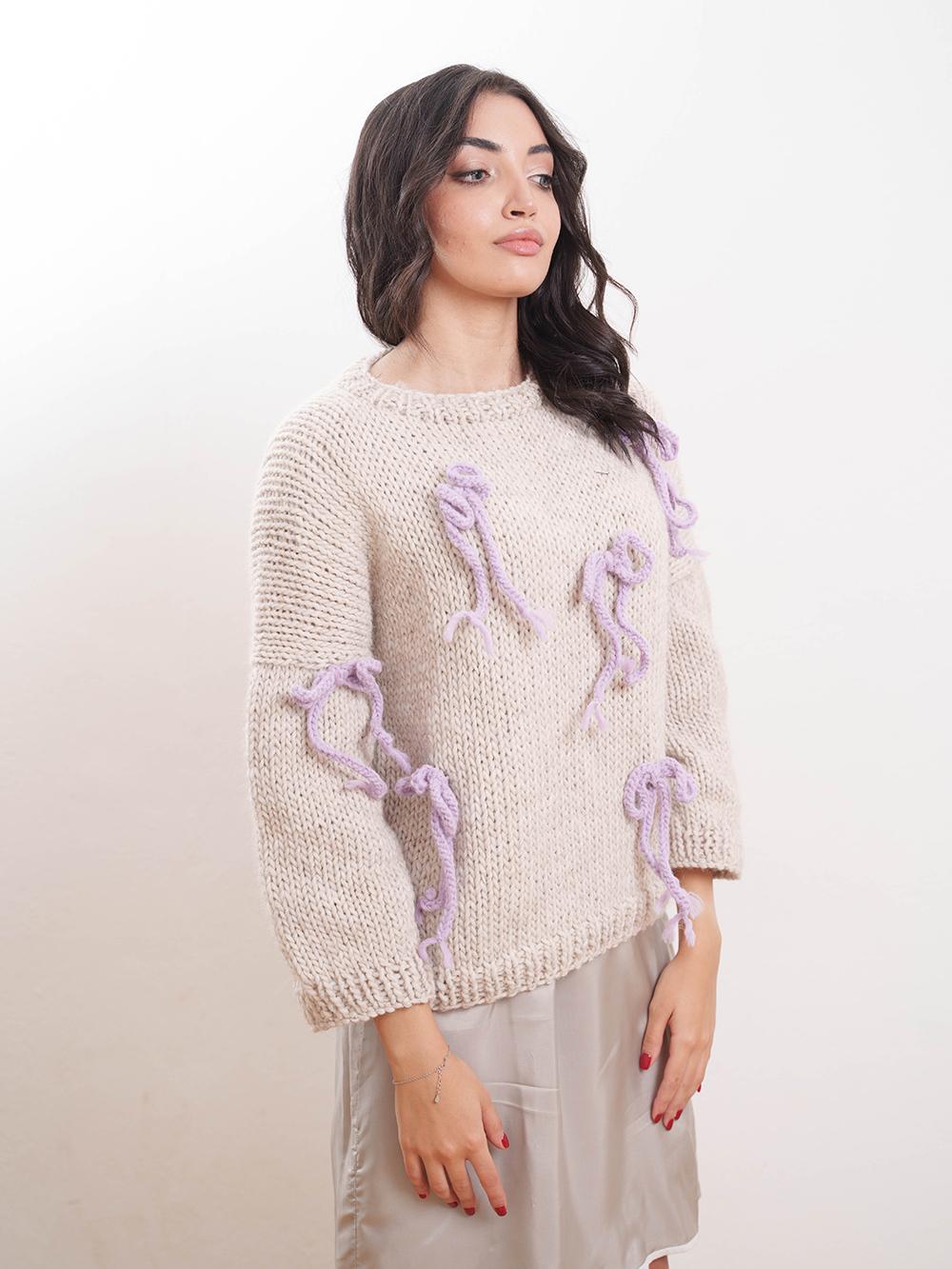 Tricot à Porter Maglia giro fiocchi applicati Moda