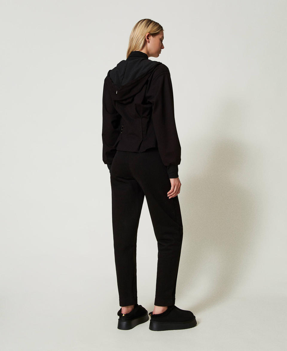 Twin Set Pantaloni a sigaretta in felpa Sostegno trimestrale
