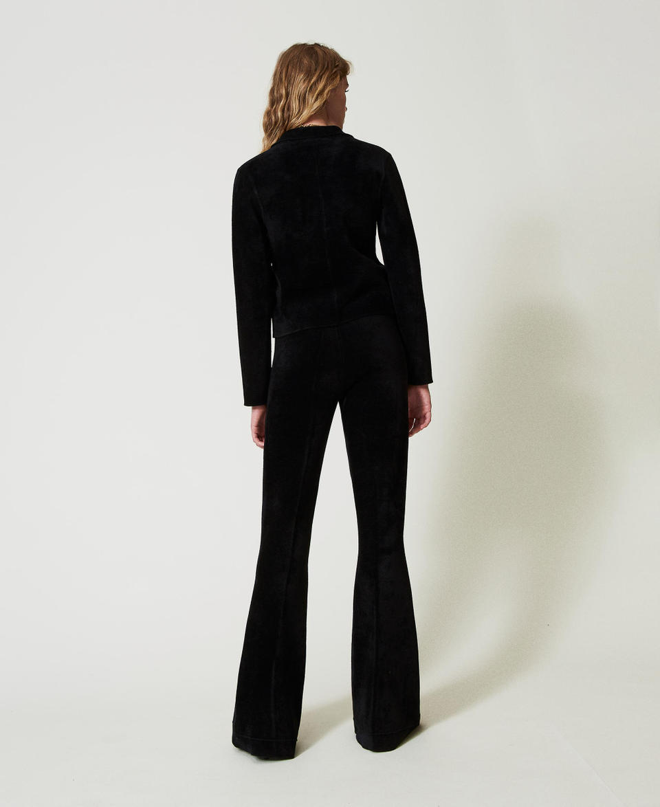 Twin Set Pantaloni flare in maglia con bottoni Oval T Grandi sconti